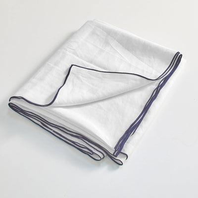 drap plat bord bourdon blanc optique plié