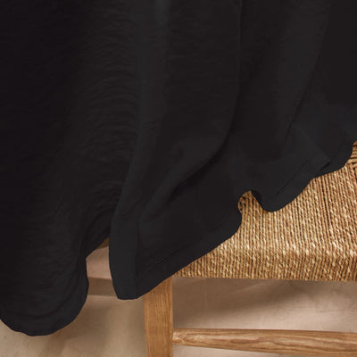 Nappe sur mesure ronde en lin ajouré encre noire