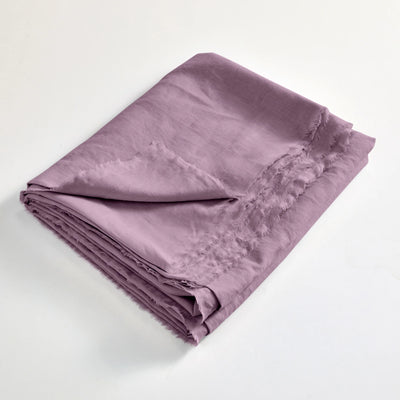 drap plat en lin lavé effrangé plié Lilas