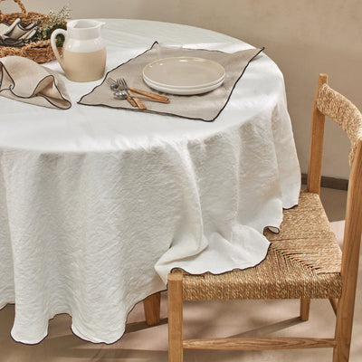 nappe ovale bordée en lin lavé sur mesure ivoire