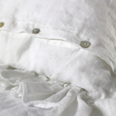Paire de taies d'oreiller en lin naturel à volants effrangés#colour_blanc-optique